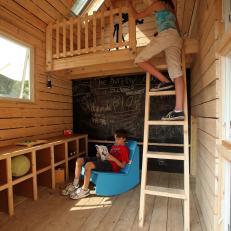 Kid's Two-Story Playhouse With Spruce Walls, Fun Blue Rocker and Chalkboard Wall 