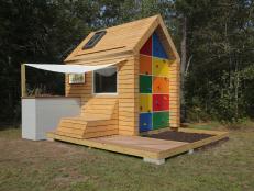 Kid's Wood Playhouse With Colorful Climbing Wall