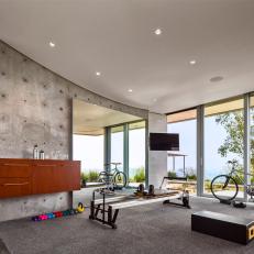 Modern Home Gym Features Natural Light & Floating Storage