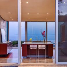 Modern Kitchen Features Glass Walls & Spectacular View
