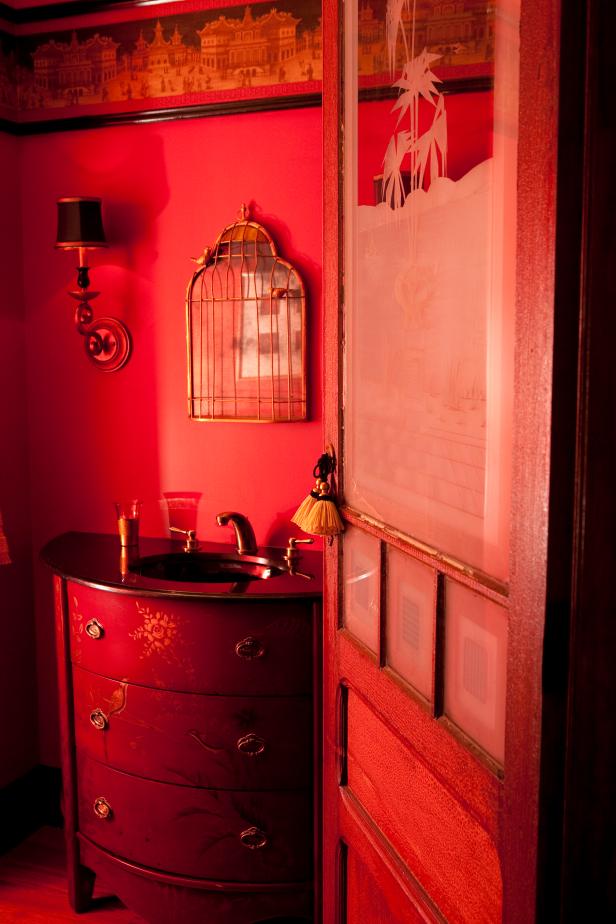 Eclectic Bathroom With Red Walls And Funky Mirror Eclectic Bathroom With Red Walls And