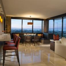 Modern Dining Area With Open Floor Plan and Bar Seating