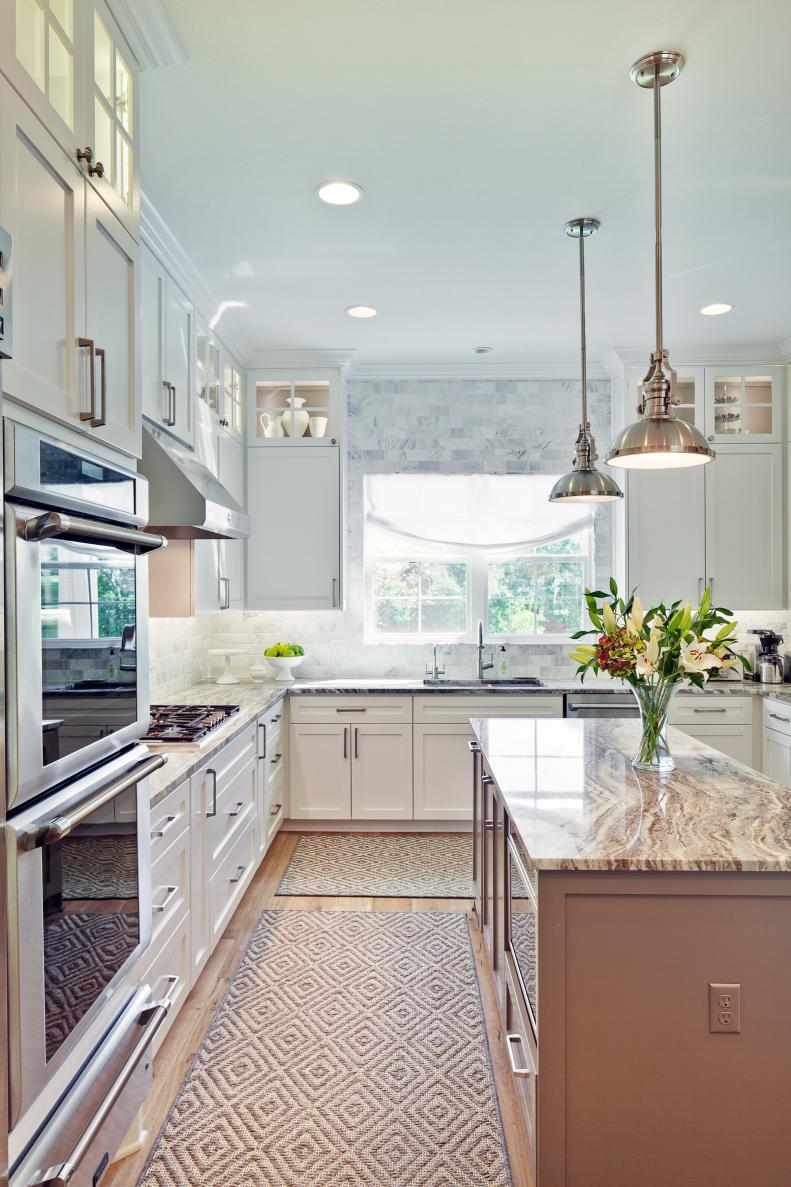 White Transitional Kitchen With Metal Pendants & White Cabinets