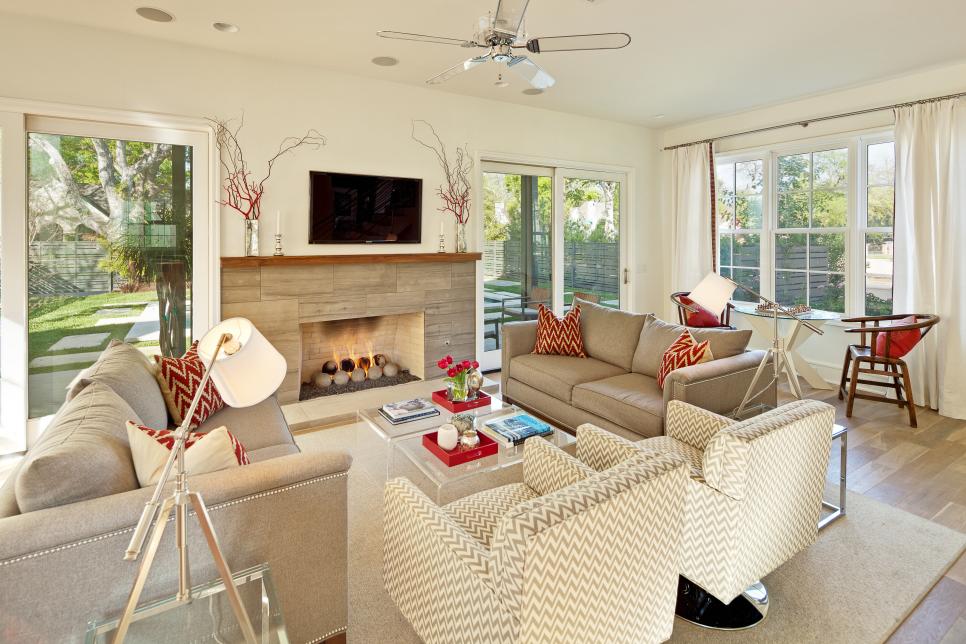 Contemporary White Living Room With Gray Sofas and Fireplace