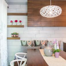 Midcentury Modern Dining Nook With White Tile Walls
