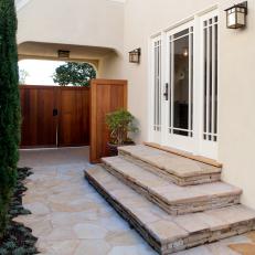 Convenient Side Entrance With Stone Walkway