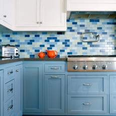 Chic Blue Kitchen With Subway Tile Backsplash and Cork Floor 