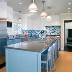 Bright, Contemporary Blue Kitchen With Cork Floor 