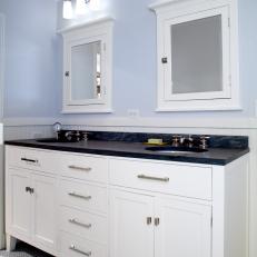 Craftsman Blue Double Vanity Bathroom With Penny Tile Floor and Painted Ceiling 