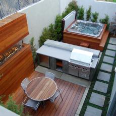 Enclosed Backyard With Above-Ground Hot Tub & Fire Wall