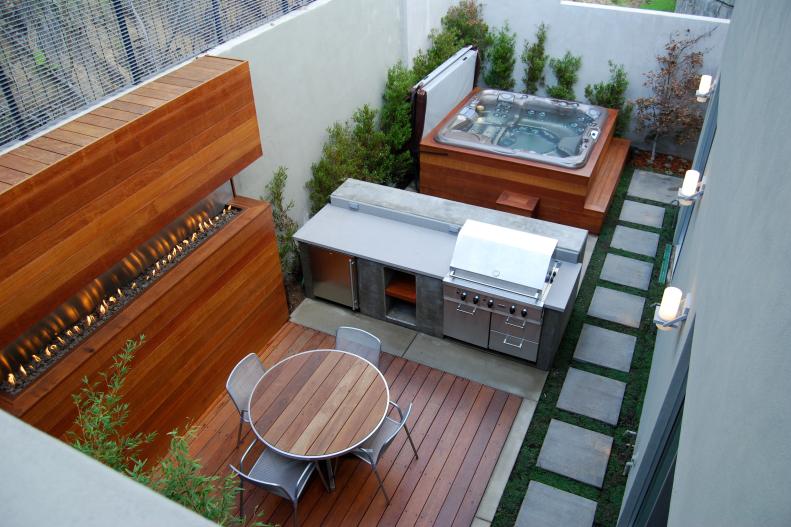 Enclosed Backyard With Deck, Fire Wall and Encased Hot Tub