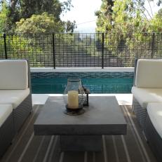 Contemporary Patio With Woven Outdoor Loveseats 