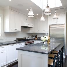 Modern White and Gray Kitchen with Skylight 