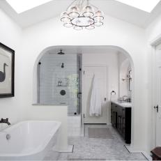 Elegant White Master Bathroom With Relaxing Soaking Tub
