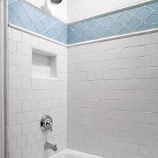 White Traditional Shower With Blue Tile Accent 