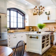 Gorgeous White French Country Kitchen With Arched Window