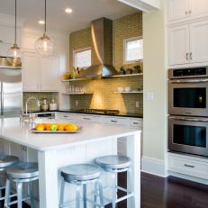 Transitional Kitchen With White Cabinets and Island