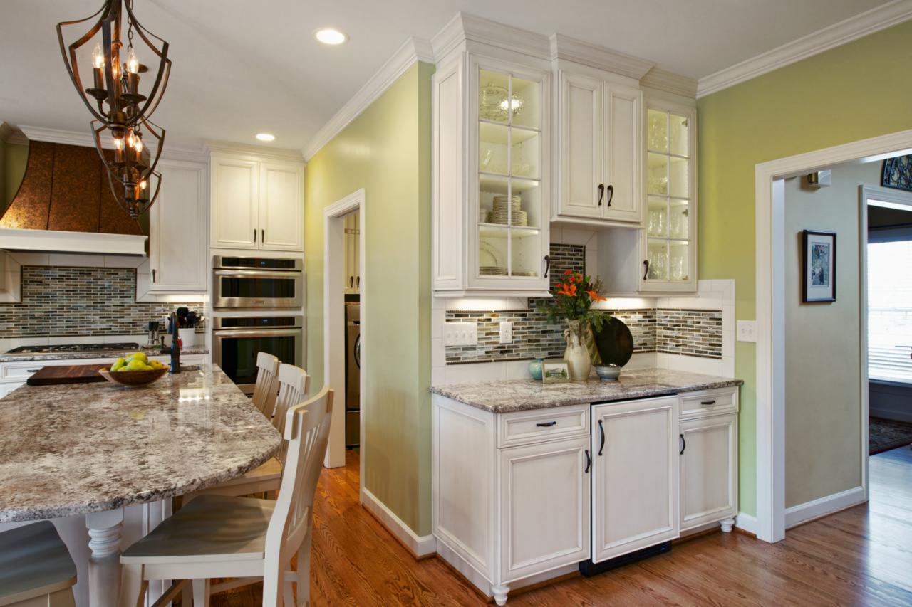 Traditional Kitchen With Marble Countertops And Wrought Iron