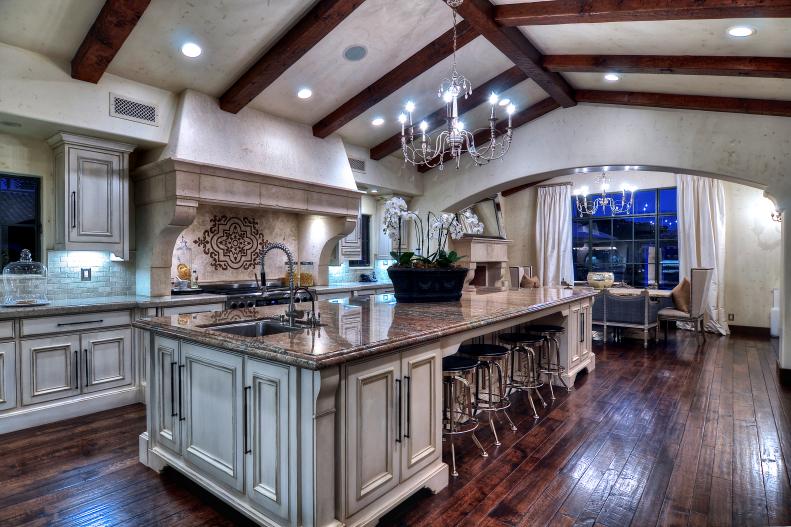 Traditional Kitchen With White Island and Barstools 