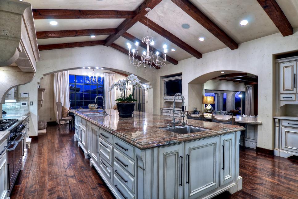 White Traditional Kitchen With Distressed Ceiling Beams and Floors 