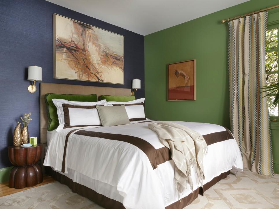 Green and Navy Bedroom With Neutral Headboard & White Bedding