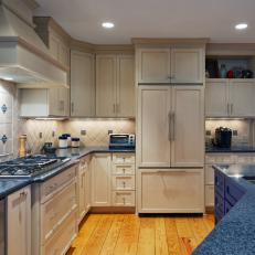 Transitional Kitchen With White Paneled Refrigerator
