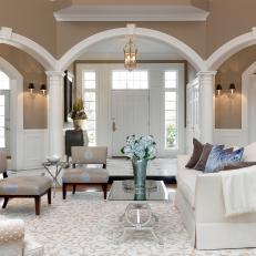 Bright and Airy Transitional Living Room With Arched Doorways