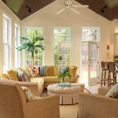 Tropical Poolhouse Living Room With Wicker Furnishings