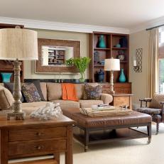 Neutral Transitional Living Room With Leather Ottoman