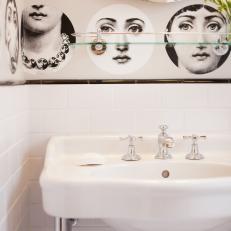 Bathroom With Classic White Sink & Fornasetti Wallpaper