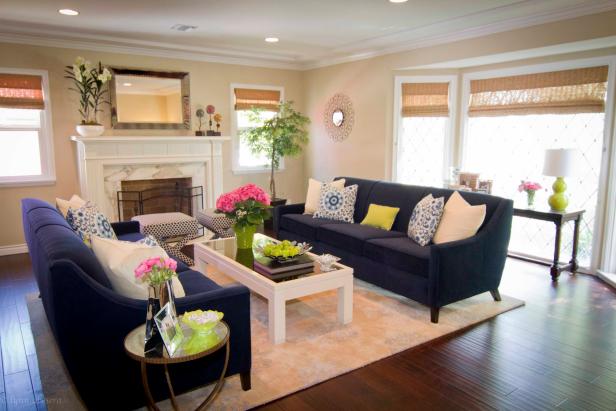 Neutral Transitional Living Room With Twin Blue Sofas | HGTV