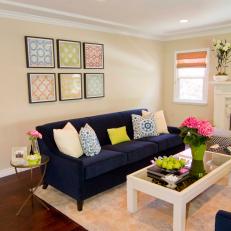 Neutral Transitional Living Room With Navy Blue Sofa