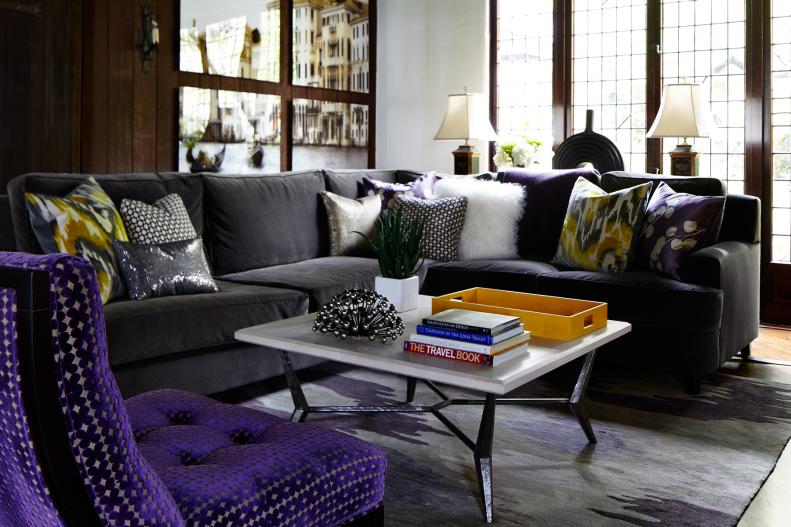 Gray Sectional, White Coffee Table & Purple Chair in Living Room