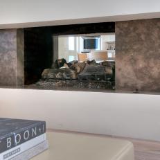 Double-Sided Fireplace With Oblong Surround