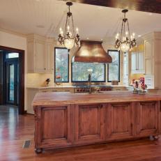 Chic Country Kitchen With Large Wooden Island