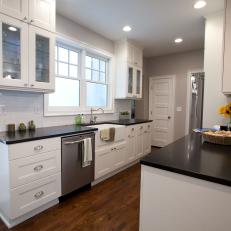 Transitional White Kitchen With Black Countertops