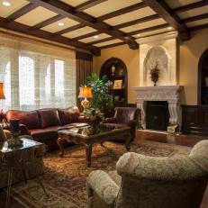 Mediterraean Family Room With Stone Fireplace