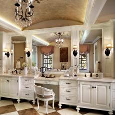 French-Style Bathroom With Dual Vanity and Makeup Desk