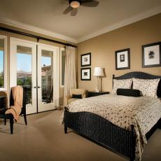Beige and Black Transitional Bedroom with Patio