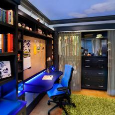 Boy's Blue Bedroom With Built-In Desk