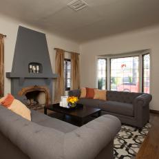 Living Room With Large Gray Fireplace
