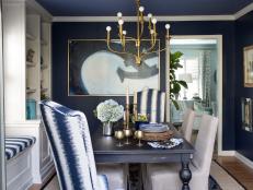 Blue Dining Room With Traditional Wood Table and Bronze Chandelier