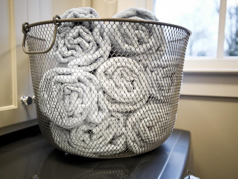 Metal Wire Basket With White Linens