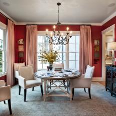 Red Dining Room With White Upholstered Chairs