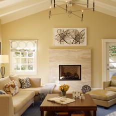 Living Room With Fireplace and Beamed Ceiling