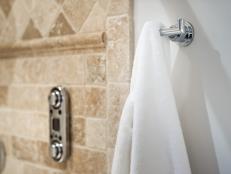 Beige Tile Shower With Digital Control and Chrome Towel Hook