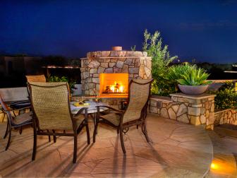Outdoor Living Space with Fireplace and Neutral Furnishings 