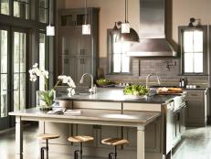 Gray Industrial Kitchen With Neutral Cabinets 