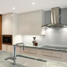 Modern Kitchen With White-Lacquered Cabinets
