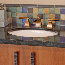Southwestern Bathroom With Waterfall Sink Faucet